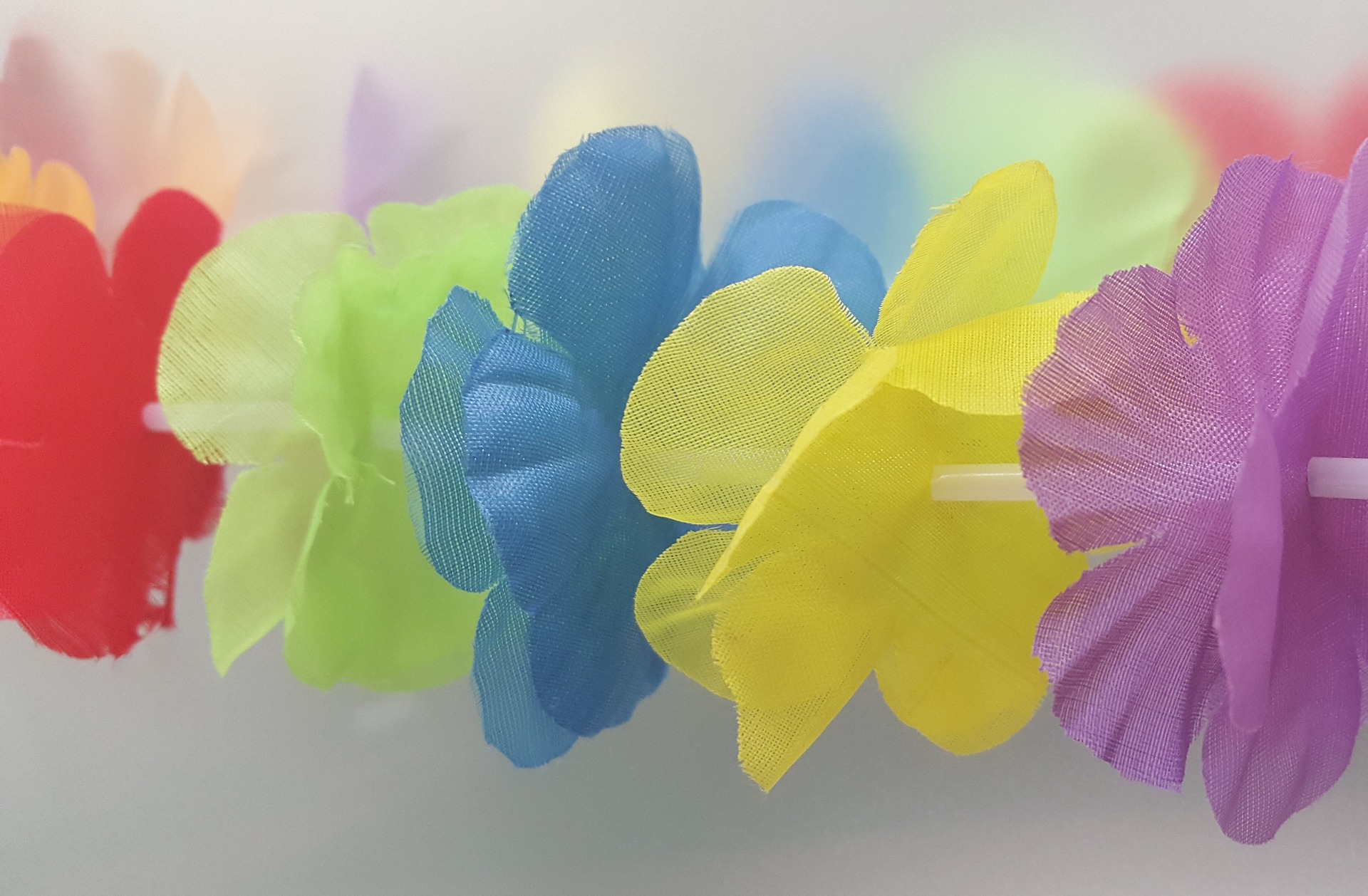 Hawaiian Leis are easy to make and are the perfect accessories for a tropical luau. 